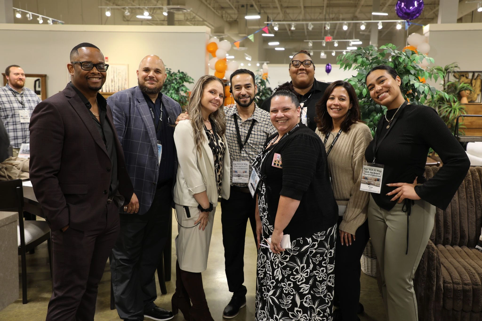 Regency Management Services team on the floor at the Ashley HomeStore promotional event