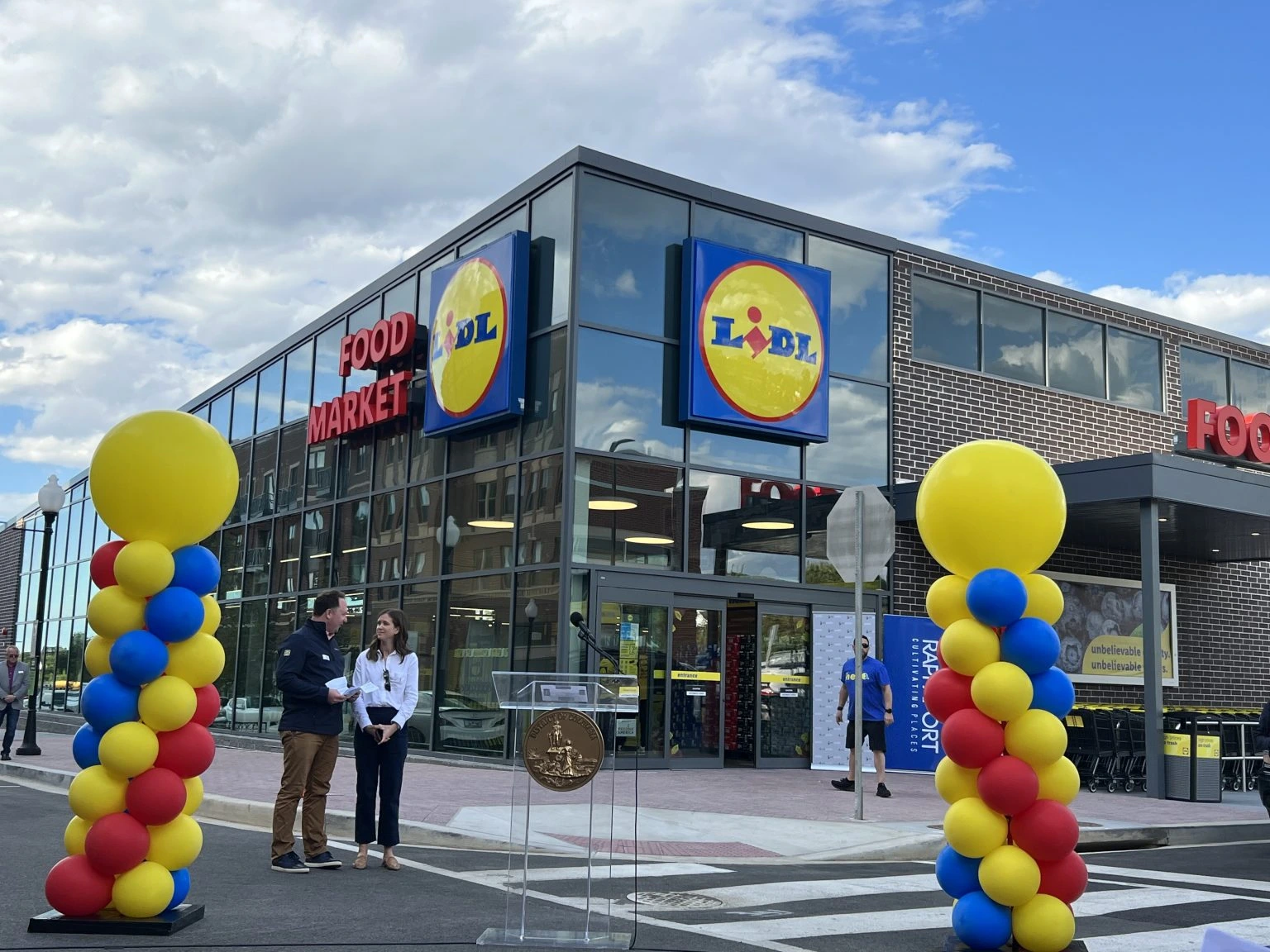 Legacy Marketing LIDL grocery store opening host on-mic community welcome
