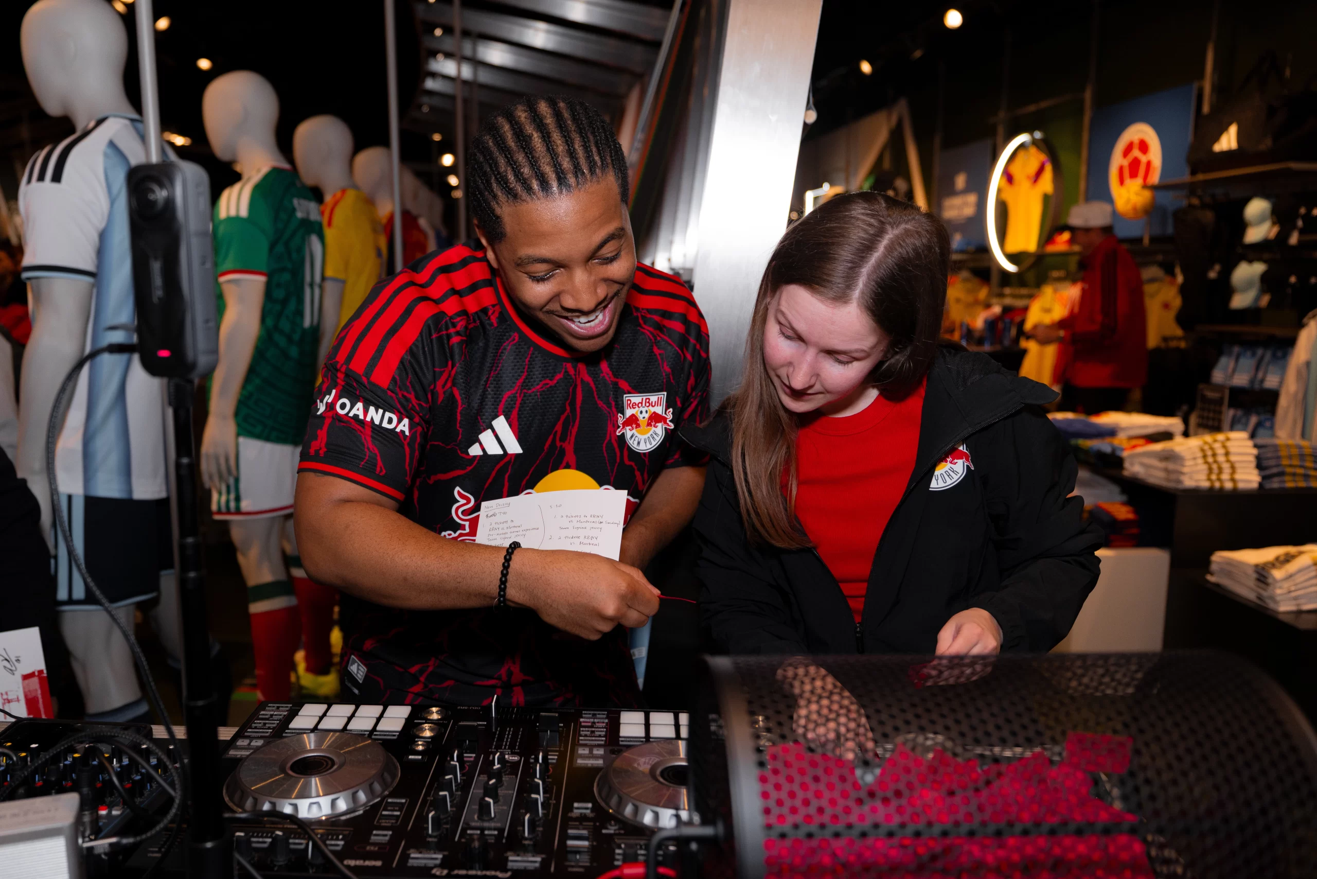MLS New York Red Bulls adidas American Dream store activation - Raffle giveaway moment with a Red Bull New York fan