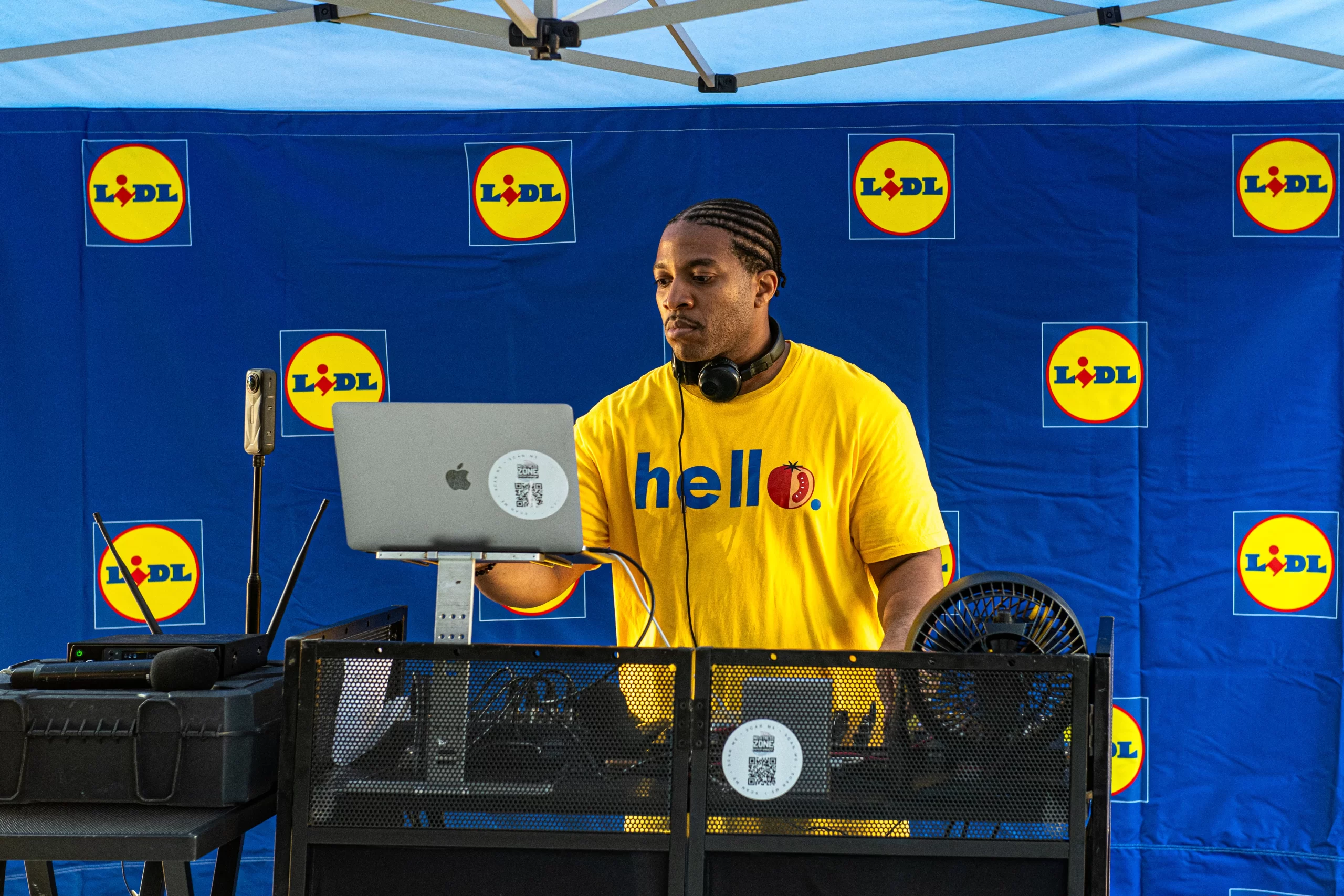 DJ Reese on the mic and the decks at a corporate brand activation