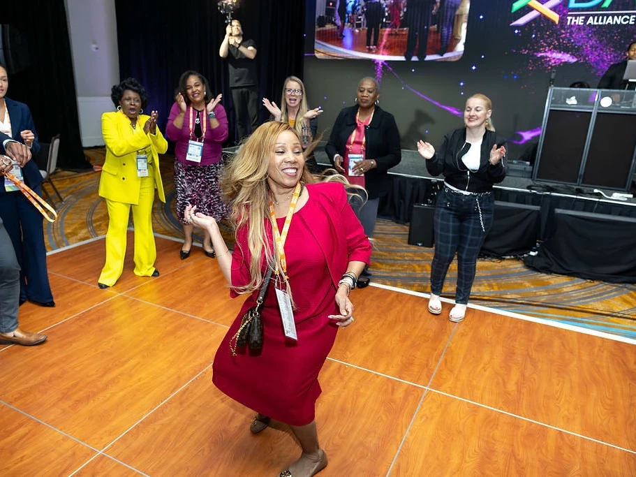 Attendees dancing at the Diversity Alliance for Science conference as corporate event DJ DJ Reese plays